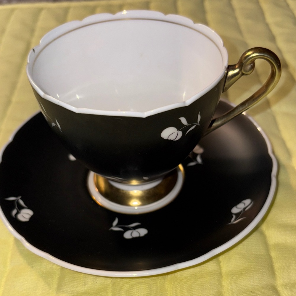 SHELLEY Black matte, white and Gold footed  Floral Tea Cup and Saucer $90